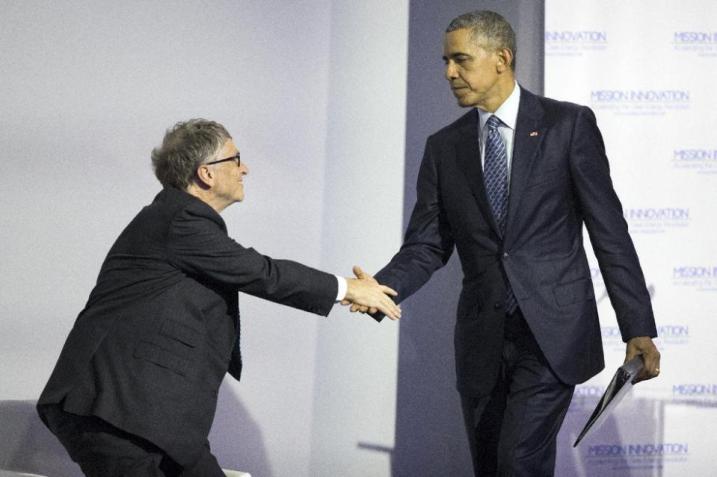 President Barack Obama, right, shakes hands with Bill Gates after delivering remarks during a Mission Innovation event at COP21, United Nations Climate Change Conference, in Le Bourget, outside Paris, on Monday, Nov. 30, 2015. (AP Photo/Evan Vucci)